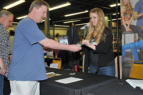 Making the exchange - photo by Cliff Tooker Making the exchange - photo by Cliff Tooker